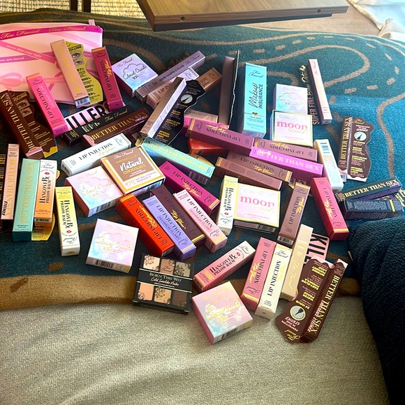 Over 50 Too Faced products worth over $1400- plus a makeup bag and large tote.